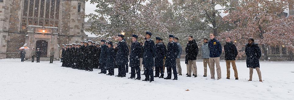 ROTC and students on campus in the snow
