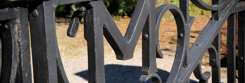 Gate with an M incorporated into the design